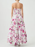 Floral strapless dress on a plain background