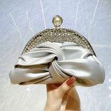 Luxurious Twisted Knot Rhinestone Embellished Clutch