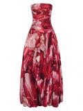 Red floral strapless dress on a white background