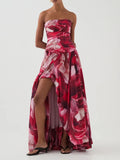 Red floral strapless gown on a white background